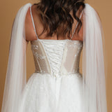 corset princess wedding dress with off the shoulder tulle cape and vine, floral and beaded details