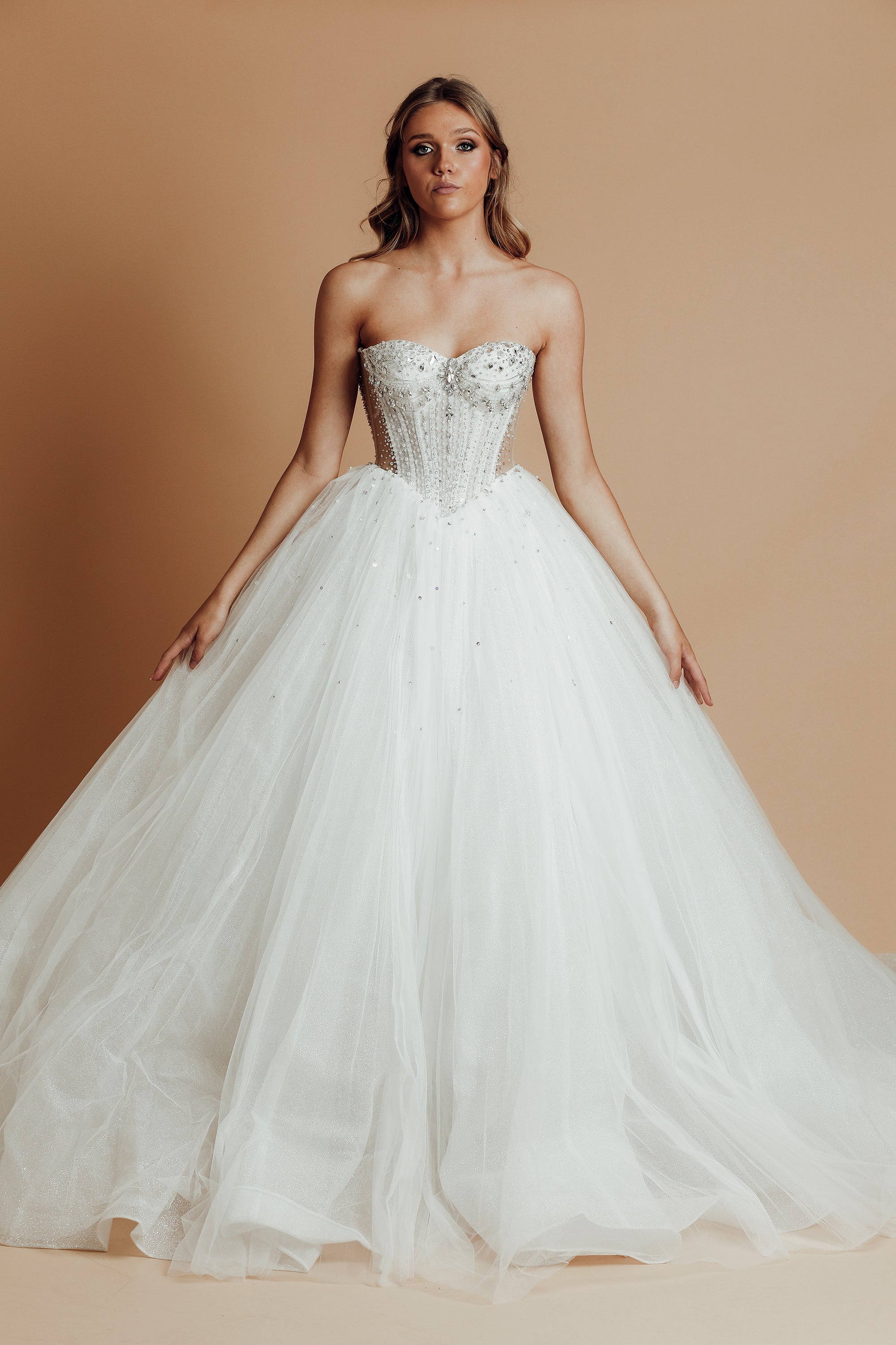 White sparkling corset princess dress with basque waist