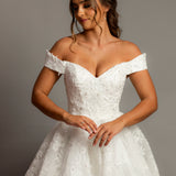 Off the shoulder lace all over ballgown wedding dress with a corset back for hire
