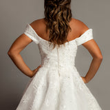 Off the shoulder lace all over ballgown wedding dress with a corset back for hire