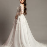 White Flowery Tulle Wedding Dress with sleeves for hire.