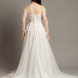 White Flowery Tulle Wedding Dress with sleeves for hire.