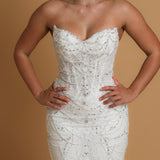 Mermaid sparkly dangling wedding dress with wavy neckline for hire