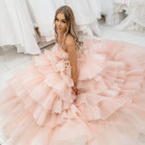 Nudish pink with a bushier top and a bushier puffy layered skirt.