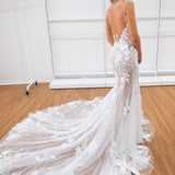 Sparkling white lace under nude wedding dress