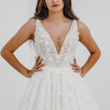 Sparkling white V neck wedding dress with open back for hire