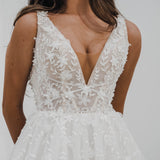 Sparkling white V neck wedding dress with open back for hire