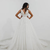 Sparkling white V neck wedding dress with open back for hire