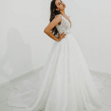 Sparkling white V neck wedding dress with open back for hire