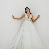Sparkling white V neck wedding dress with open back for hire