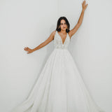 Sparkling white V neck wedding dress with open back for hire