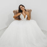 Sparkling white V neck wedding dress with open back for hire