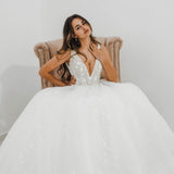 Sparkling white V neck wedding dress with open back for hire