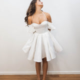 White satin short dress with off the shoulder sleeves