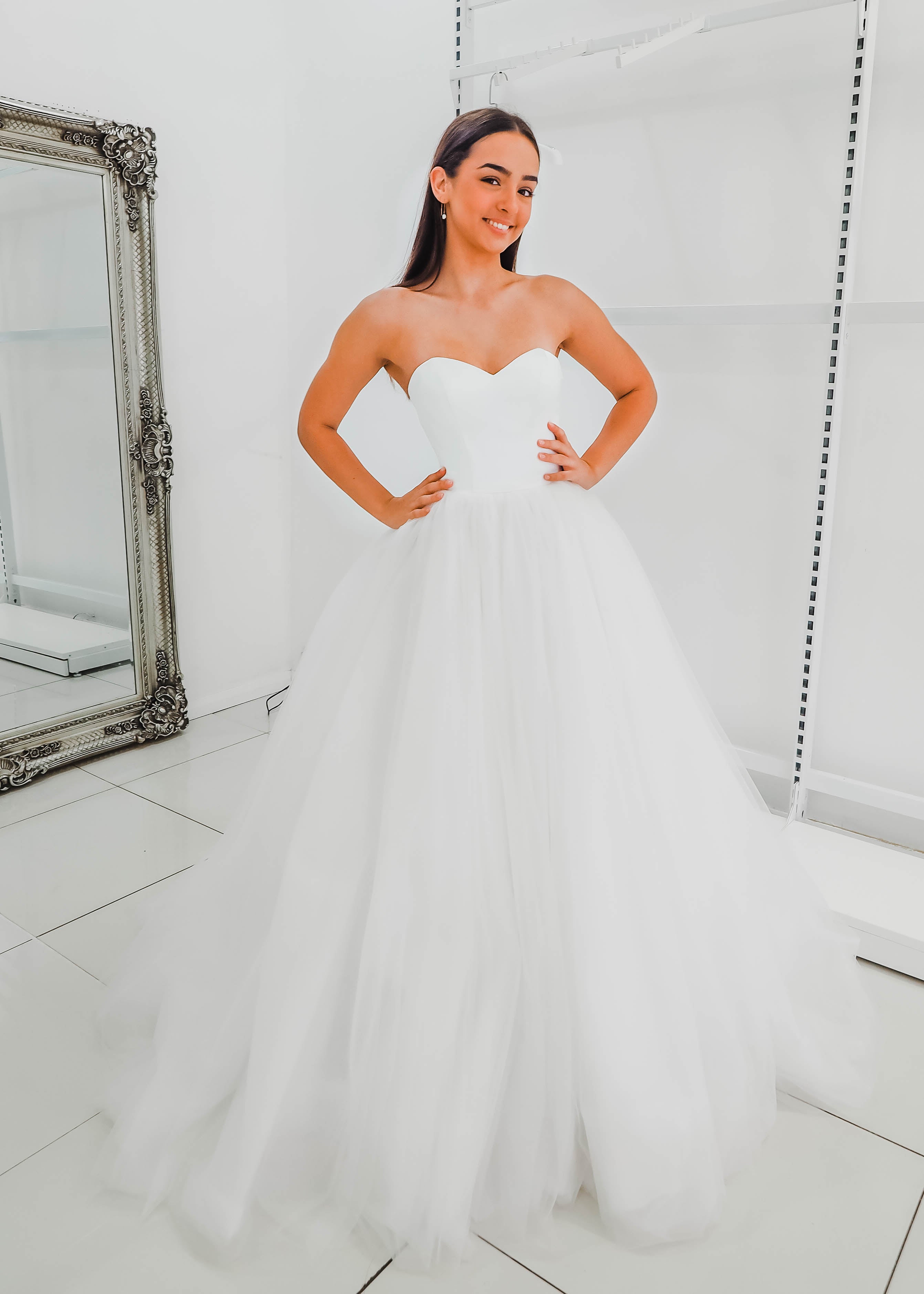 White sweetheart neckline and satin bodice with puffy tulle skirt wedd