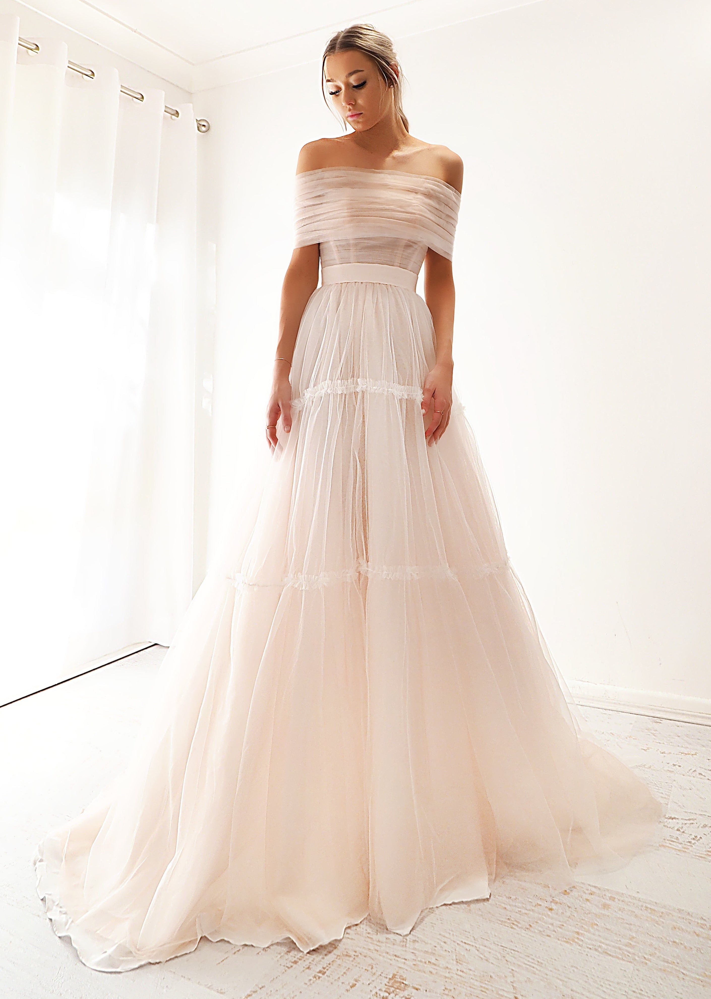 Strapless or off the shoulder level blush tulle dress