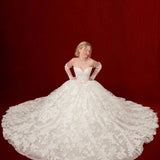 ballgown wedding dress with floral lace and detachable romantic sleeves.