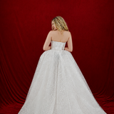 A dreamy white wedding gown with sparkling lace and fairytale elegance for hire