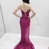 Beaded magenta strapless corset dress for hire