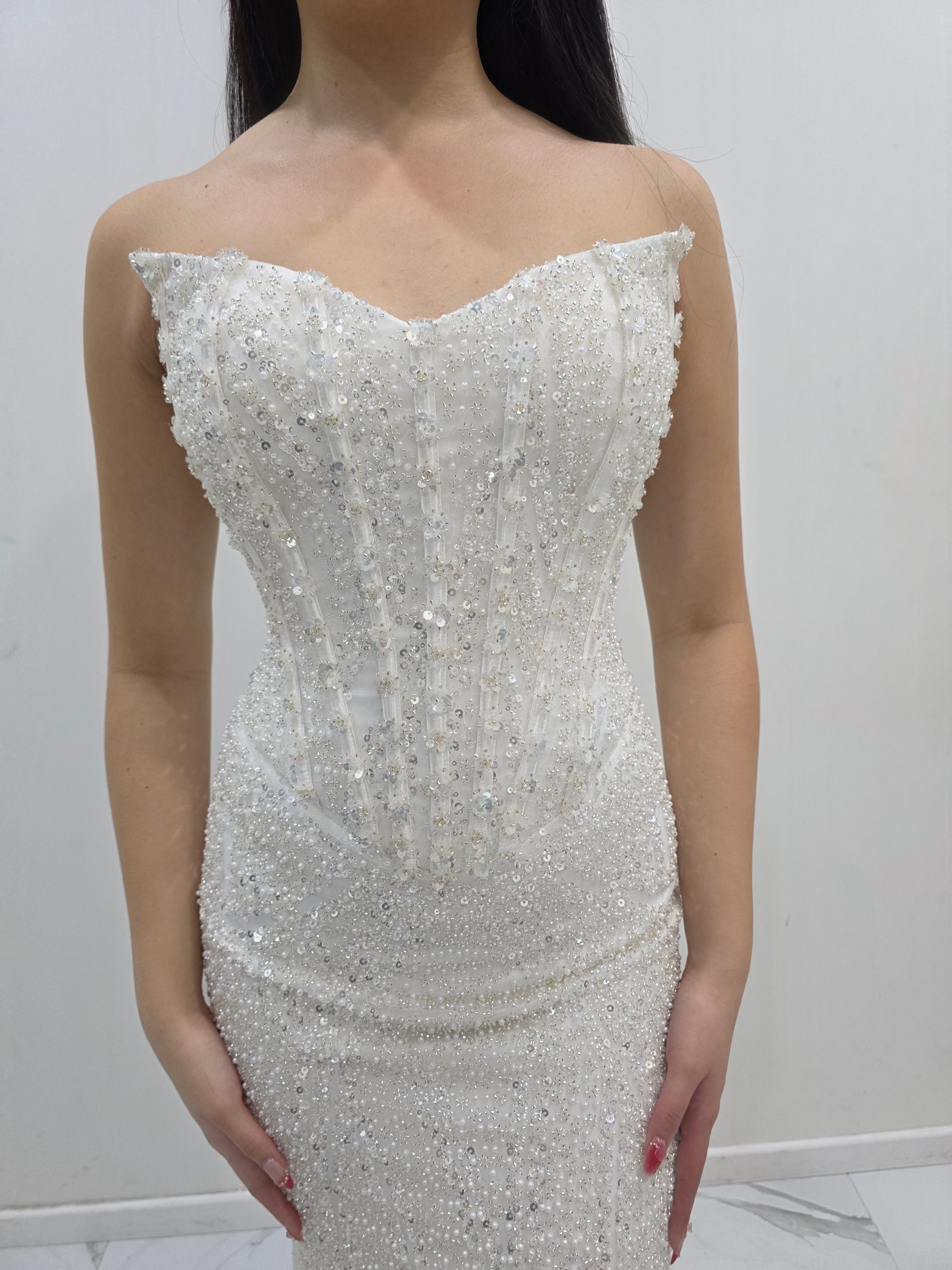 Ivory white beaded dress with basque waist and open back for hire ...