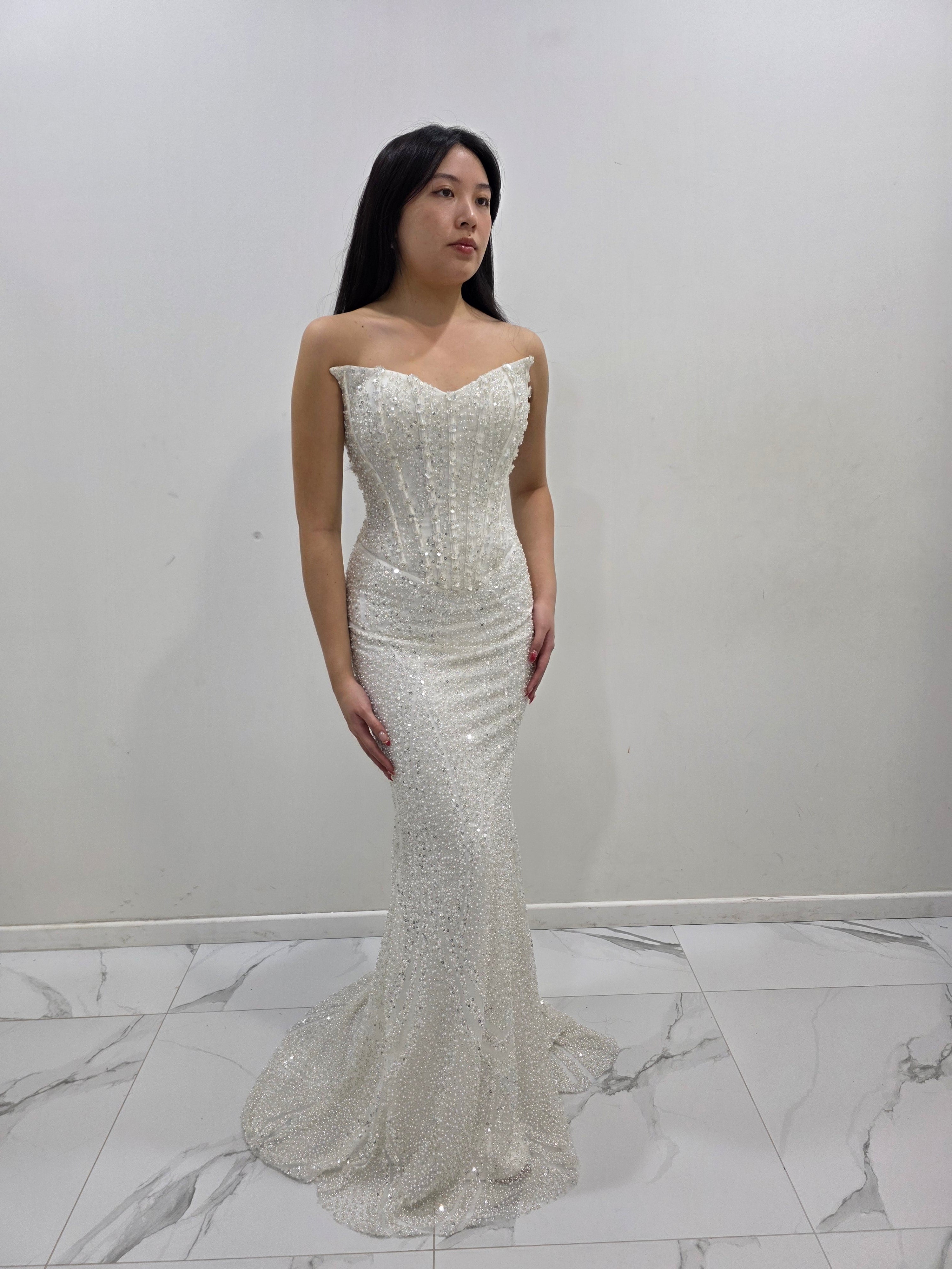 Ivory white beaded dress with basque waist and open back for hire ...