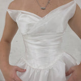 satin A-line wedding dress featuring a sculpted bodice, pearl waist detail, and timeless sophistication for hire