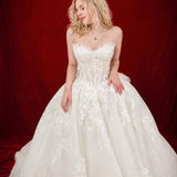 ballgown wedding dress with floral lace and dramatic detachable bow