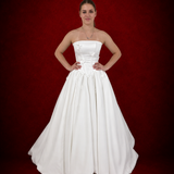 romantic satin wedding dress featuring a drop waist, 3D floral details, and timeless elegance for hire