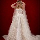 A-line wedding dress featuring 3D florals, sparkling lace, and a modern slit for hire