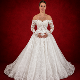 romantic lace ballgown wedding dress featuring off-shoulder sleeves, exposed boning, and timeless elegance