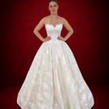 sparkling ivory lace wedding dress featuring a sweetheart neckline, corset back, and romantic ballgown silhouette