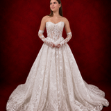 pearl-detailed lace ballgown with ethereal sleeves and regal bridal elegance.