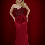 Dazzling red mermaid gown featuring a beaded corset bodice, thigh-high slit, and elegant train.
