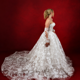 ballgown wedding dress with floral lace and detachable romantic sleeves.