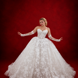 ballgown wedding dress with floral lace and detachable romantic sleeves.