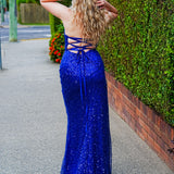 Royal blue beaded lace crescent moon neckline and a high slit dress