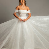 White sequins and beads all over the dress with off the shoulder sleeves for hire