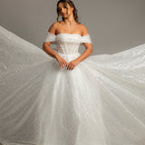 White sequins and beads all over the dress with off the shoulder sleeves for hire