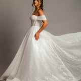 White sequins and beads all over the dress with off the shoulder sleeves for hire