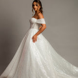 White sequins and beads all over the dress with off the shoulder sleeves for hire