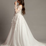White Flowery Tulle Wedding Dress with sleeves for hire.