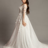 White Flowery Tulle Wedding Dress with sleeves for hire.