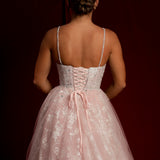 Mauve pink princess dress with crescent moon neckline and snowflake sparkles