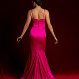 fuchsia pink dress with bustier top and high slit