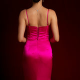 fuchsia pink dress with bustier top and high slit