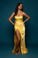Melina yellow satin column shaped dress with ribbed corset look and a high slit
