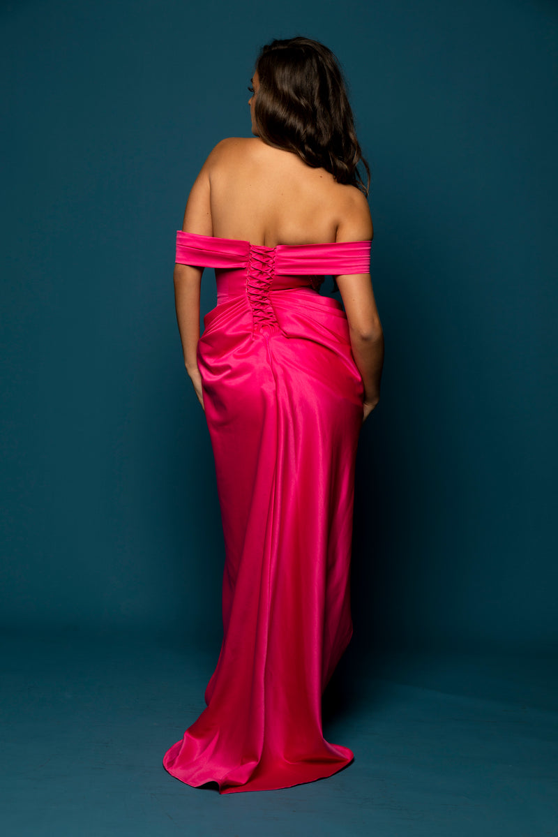Hot pink satin column shaped dress with bustier top and ruching with high slit