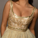 Sparkling gold tiered column dress with high slit for hire