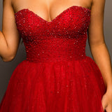 Sparkling dark red tulle dress with beaded top