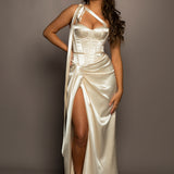 Champagne satin with bustier top and ruching along with a high slit